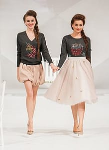 two models on a runway 